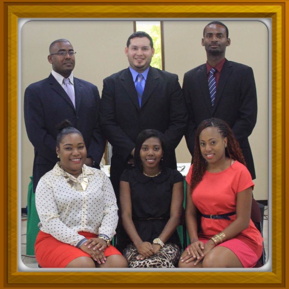 Photo of Newly Elected CRYC Executive:  From Back (Left to Right): Sean Nicholson- Representing Shanice Patrice (Trinidad & Tobago), Michael Xavier (Guyana), Timothy Ferdinand (St. Lucia)  From Front (Left to Right): Nadege Roach (Dominica), Farmala Jacobs (Antigua &Barbuda), Tiffany Daniels (Guyana)  
